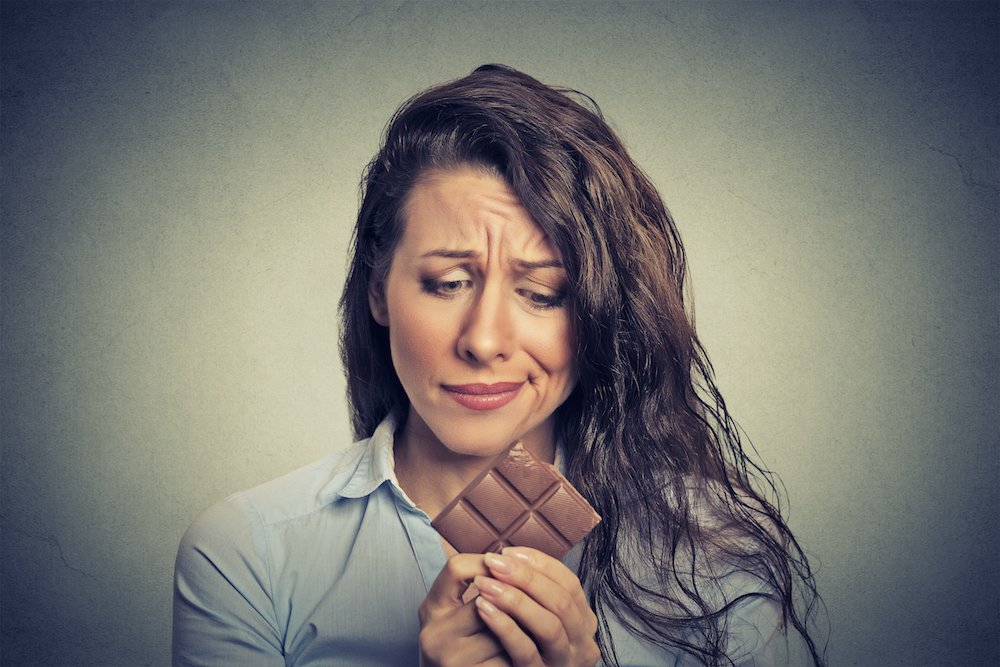Woman avoiding chocolate